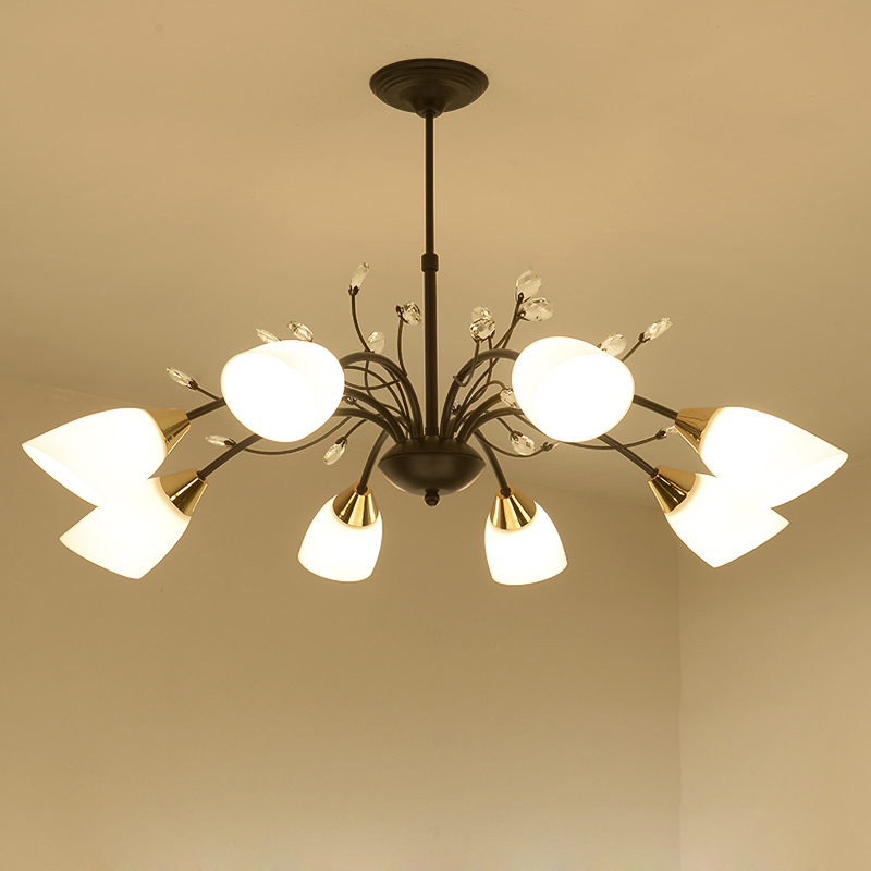 Retro Nordic-inspired wrought iron crystal chandelier for modern bedroom and dining room lighting, a simple yet elegant pendant lamp for living room decor