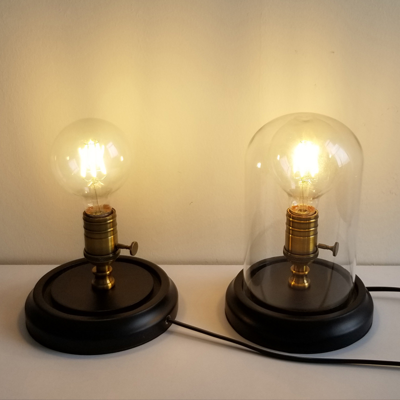 Retro-style wooden table lamp with LED bulbs and glass shades for versatile lighting