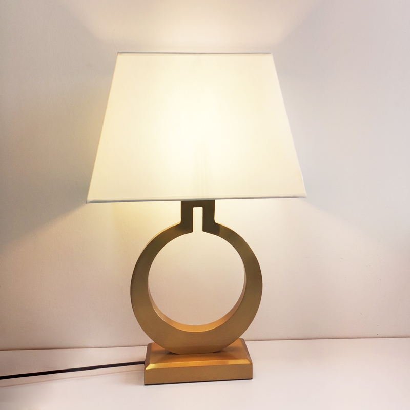 Sleek Nordic black desk lamp featuring gold accents, perfect for contemporary home decor