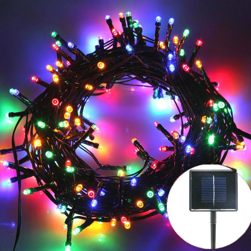 Solar-powered Christmas lights with remote, 22m length, 200 LEDs, 8 lighting modes for outdoor Xmas trees, weddings, and backyard parties