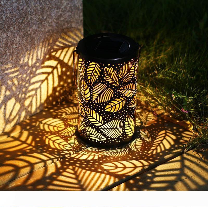 Solar-powered decorative metal hanging lamp for outdoor garden pathways and lawns