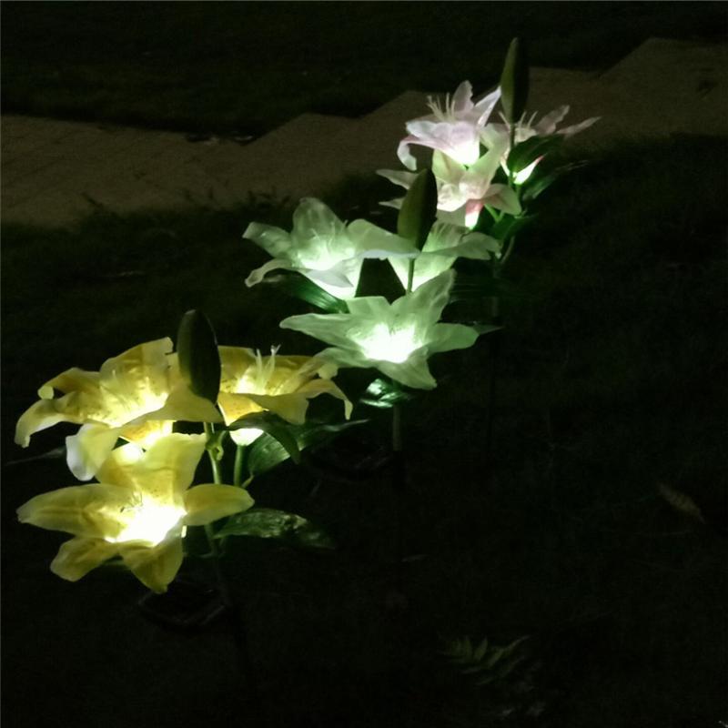 Solar-powered LED garden stake lights for outdoor landscape and yard decoration
