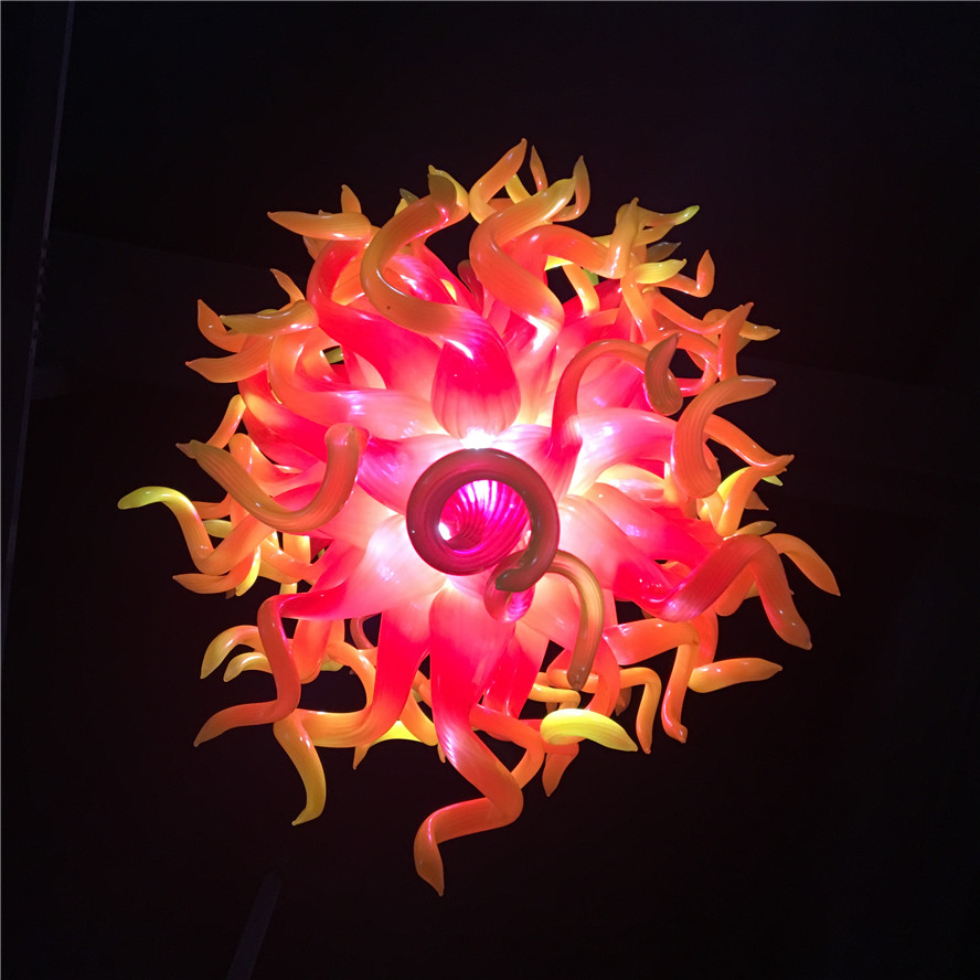 Stunning red and yellow crystal pendant chandeliers with hand-blown glass and LED lighting, perfect for modern hotel art decor