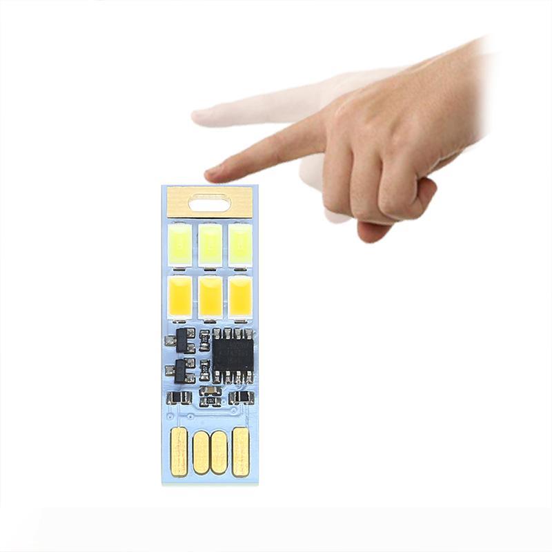 Touch-sensitive USB night light with adjustable brightness and dual color temperature for portable emergency or reading use