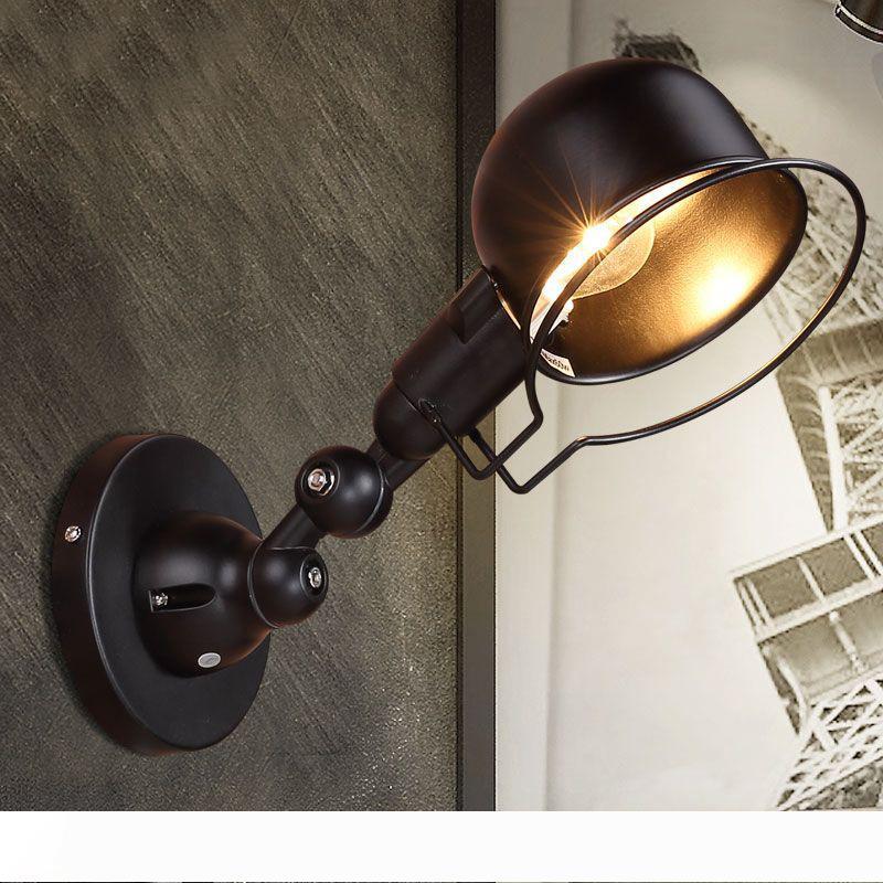 Vintage Edison-style industrial wall lamp with a retractable mechanical arm in black and white, evoking French design