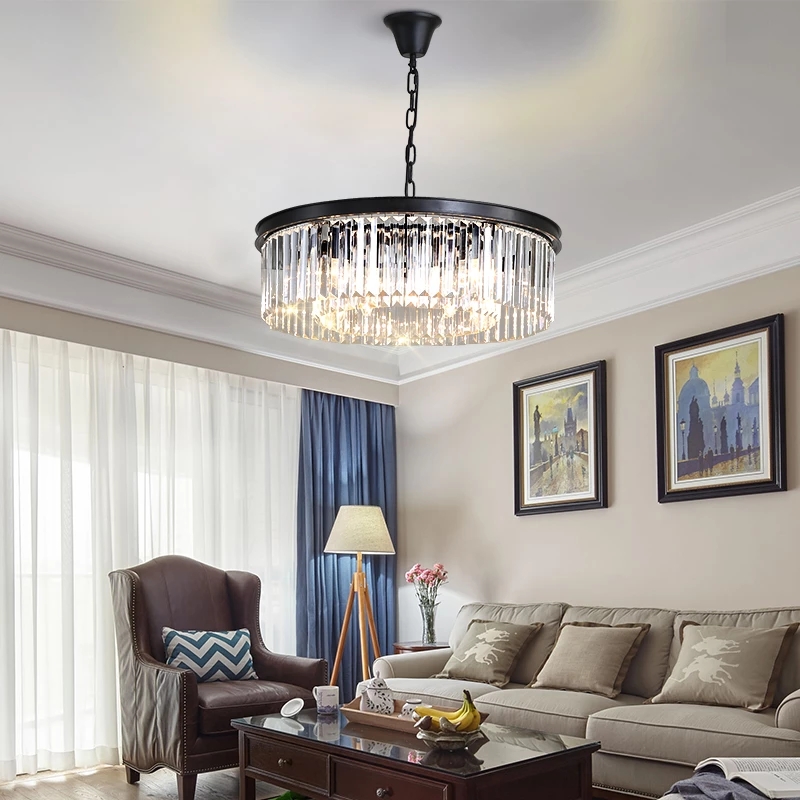 Vintage industrial-style black pendant lights with K9 crystal shades for dining rooms and staircases, featuring a Nordic-inspired suspended luminaire design
