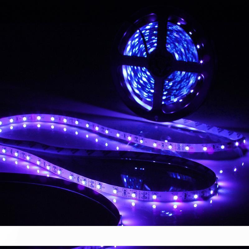 Waterproof 5-meter 60-LED 3528 SMD UV strip light with flexible tape, purple ultraviolet illumination, operates on 12V DC
