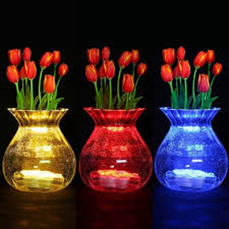 Waterproof submersible LED lights for underwater use in vases, floral arrangements, and event centerpieces like weddings and holidays
