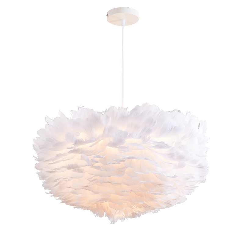 White feather pendant light for Nordic-style kids' bedrooms, a romantic modern minimalist dining room hanging lamp