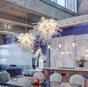 White hand-blown glass pendant lamps with energy-efficient lighting for modern homes