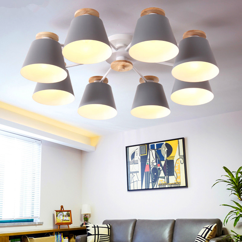 Wooden pendant lamps in grey, green, blue, yellow, and pink for kitchen lighting with chandelier-style suction top
