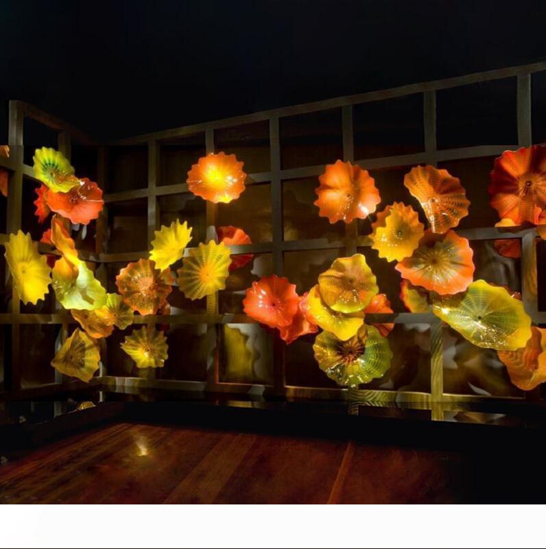 Yellow and orange blown glass wall plates, custom hotel decor, floral art plates, decorative lighting